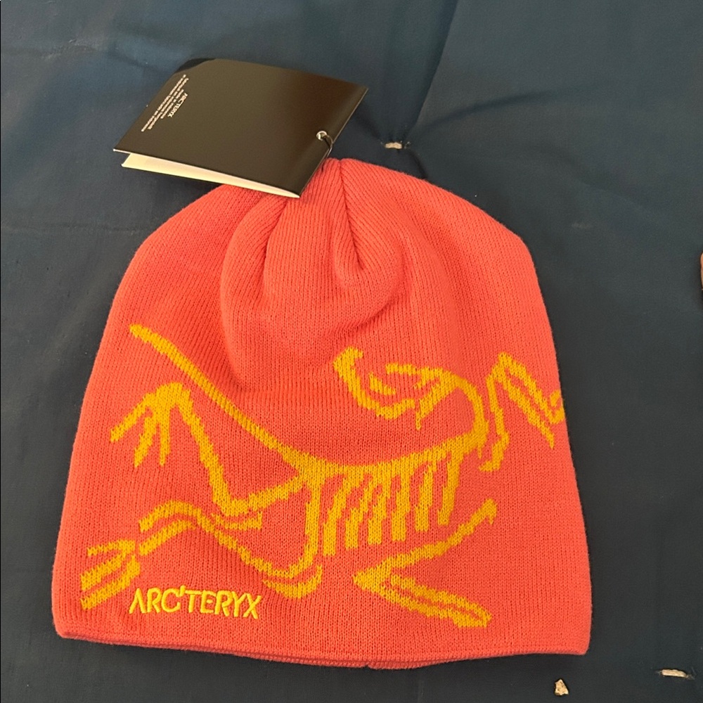 Arc'teryx Vibrant Pink Beanie with Bold Yellow Logo